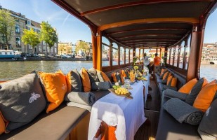 A canal tourist boat interior view in Amsterdam, Netheralnds